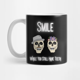 Smile While You Still Have Teeth Skulls Mug